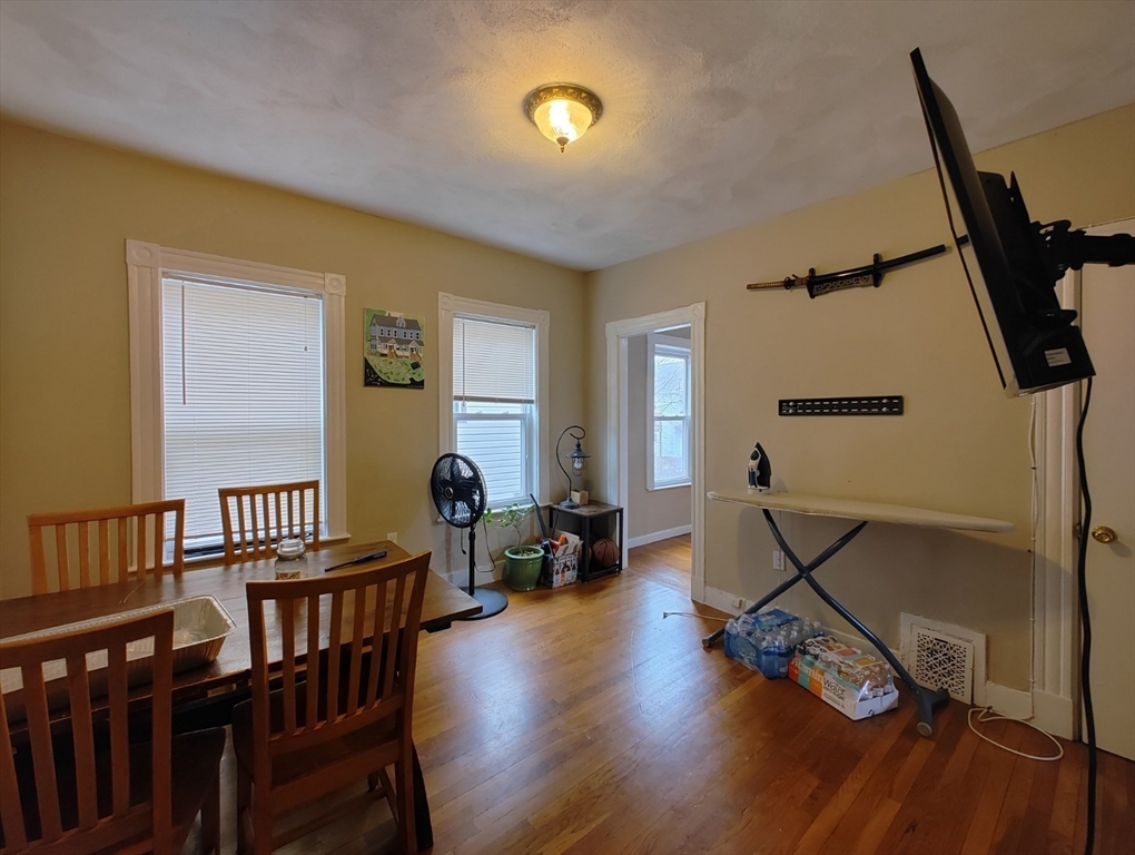 9 Medford Street, Unit 2 Medford, MA 02155 - Photo 2 of 11 a living room with furniture