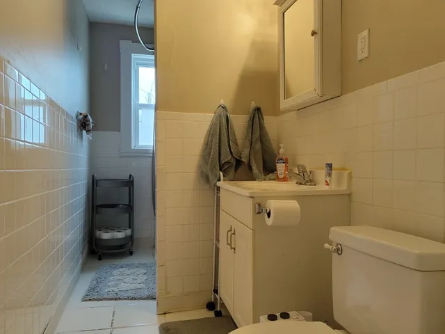 a bathroom with a sink and a toilet