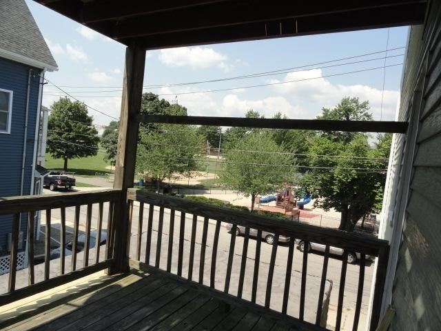 9 Medford Street, Unit 2 Medford, MA 02155 - Photo 10 of 11 a view of a balcony with wooden floor