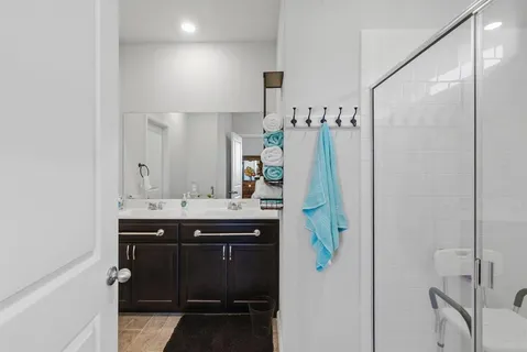 a bathroom with a sink and mirror