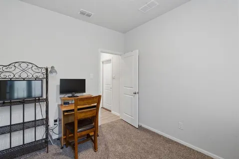 a view of a livingroom with furniture