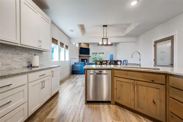 a view of a yard with a fence