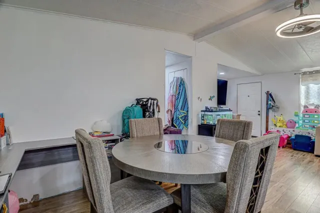 a view of a dining room with furniture