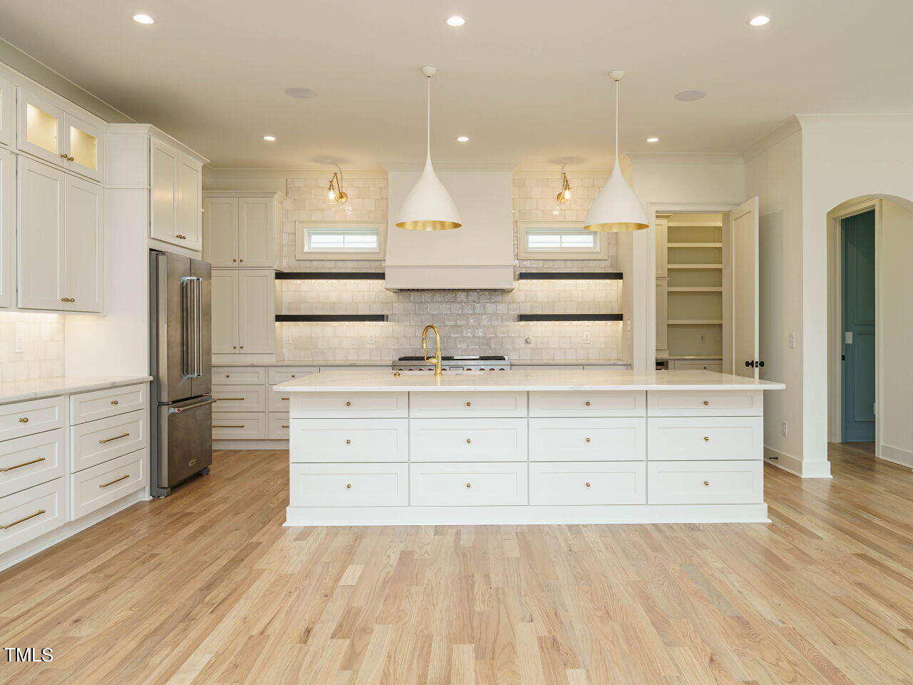 1706 Center Road Raleigh, NC 27608 - Photo 14 of 44 a large room with a large bed and a dresser