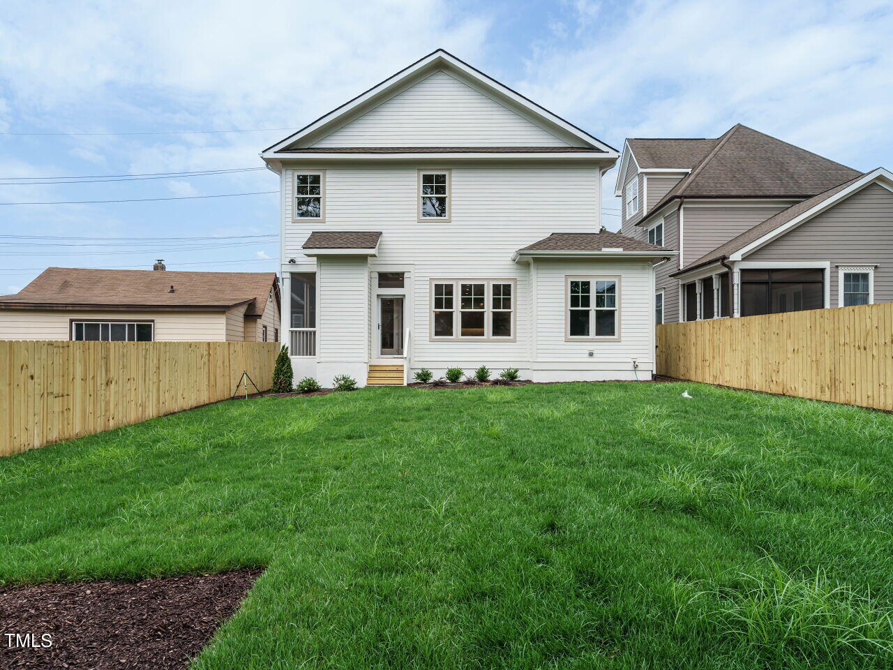 1706 Center Road Raleigh, NC 27608 - Photo 43 of 44 a front view of a house with a yard