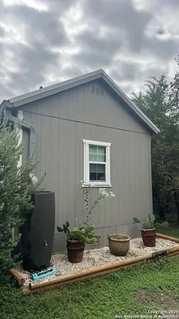 a backyard of a house with seating space