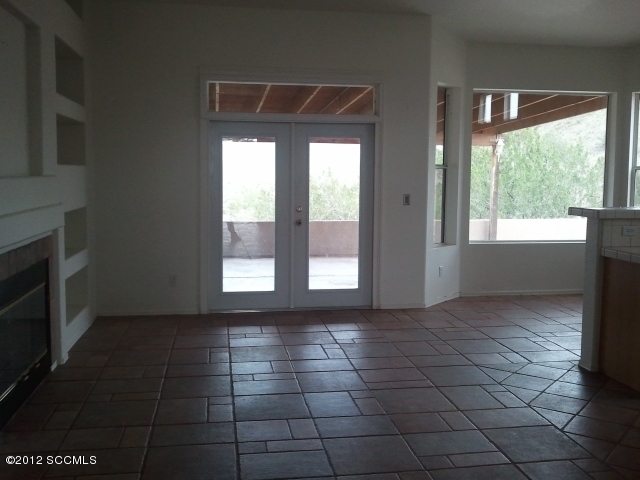 92 Back Nine Terrace Rio Rico, AZ 85648 - Photo 4 of 10 a view of an empty room with a window