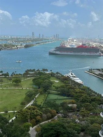 a view of a lake with a city