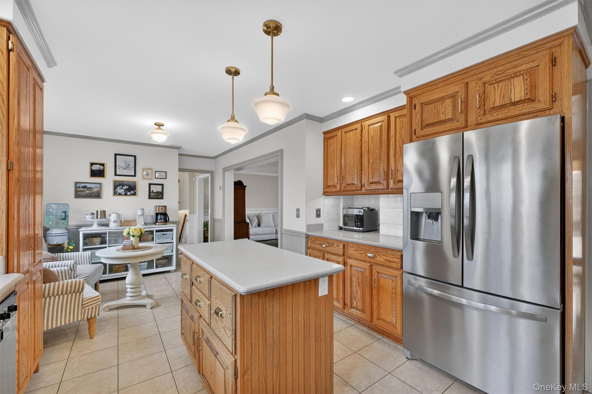 58 Dutchess Hill Road Poughkeepsie, NY 12601 - Photo 11 of 50 Open, bright kitchen with loads of cabinets, center island, corian counters and SS appliances