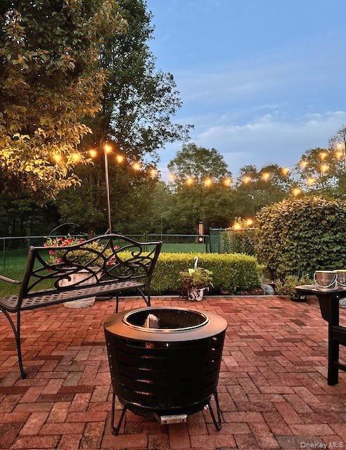 58 Dutchess Hill Road Poughkeepsie, NY 12601 - Photo 39 of 50 Expansive brick patio across the back of the home to the entrance of the pool area