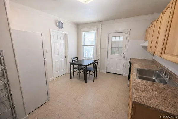 a workspace with furniture and a window