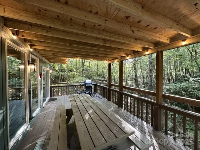a view of balcony with wooden floor