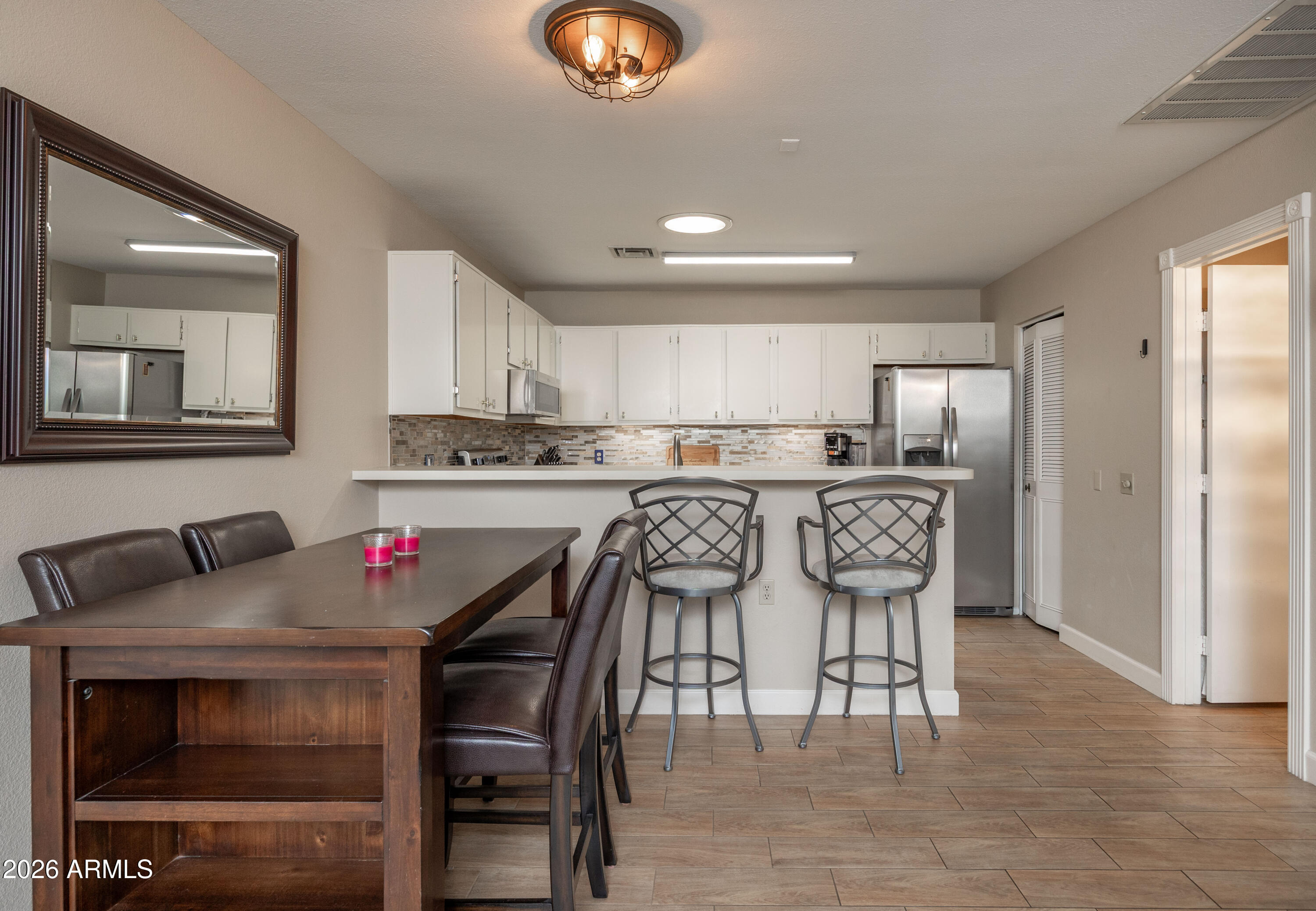 14300 West Bell Road, Unit 115 Surprise, AZ 85374 - Photo 9 of 19 Dining Area w/kitchen view