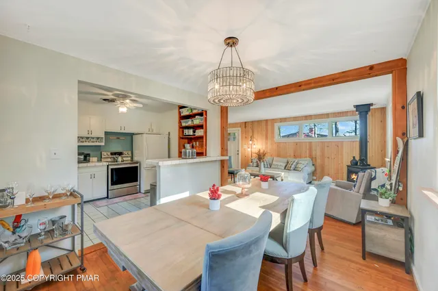 a kitchen with a sink a stove and cabinets