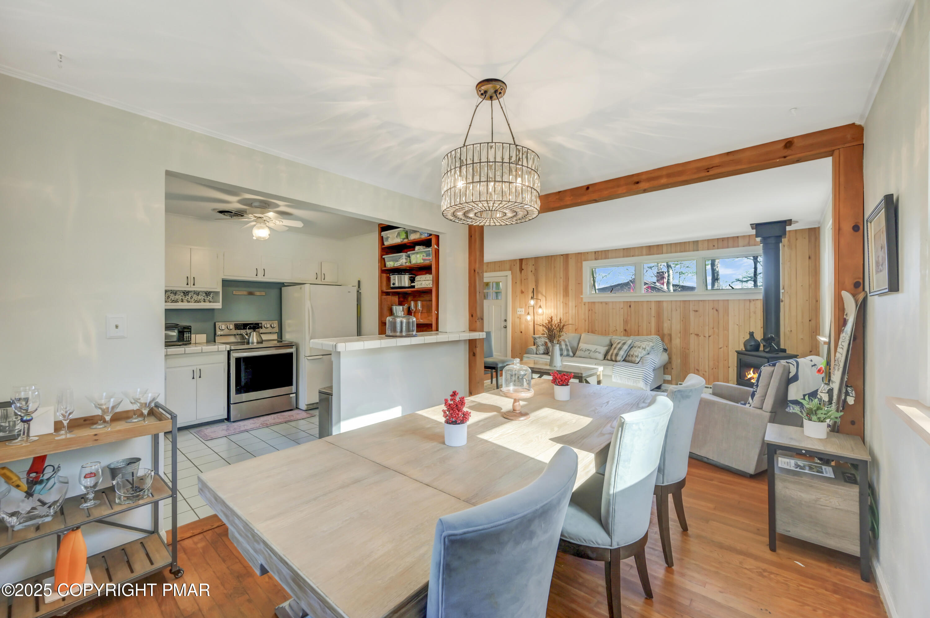 2148 Laurel Lane Cresco, PA 18326 - Photo 11 of 58 a view of a dining room with furniture window and wooden floor