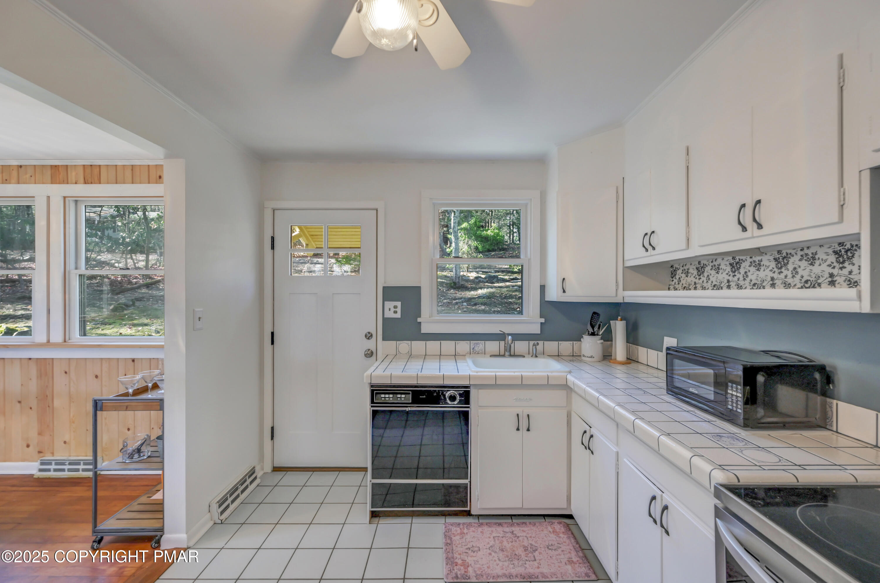 2148 Laurel Lane Cresco, PA 18326 - Photo 14 of 58 a kitchen with stainless steel appliances granite countertop a stove and a sink