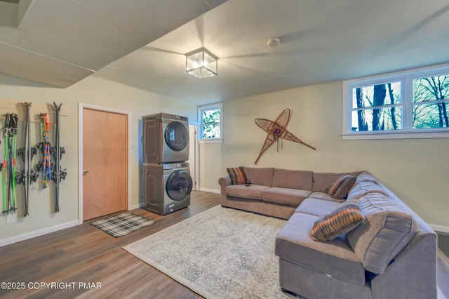 a backyard of a house with outdoor seating