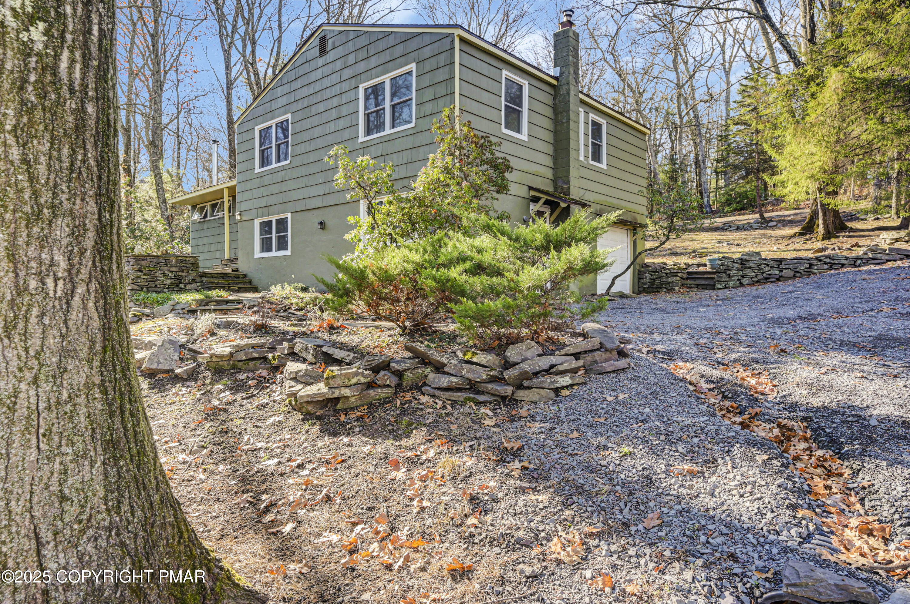 2148 Laurel Lane Cresco, PA 18326 - Photo 31 of 58 a view of a house with a yard