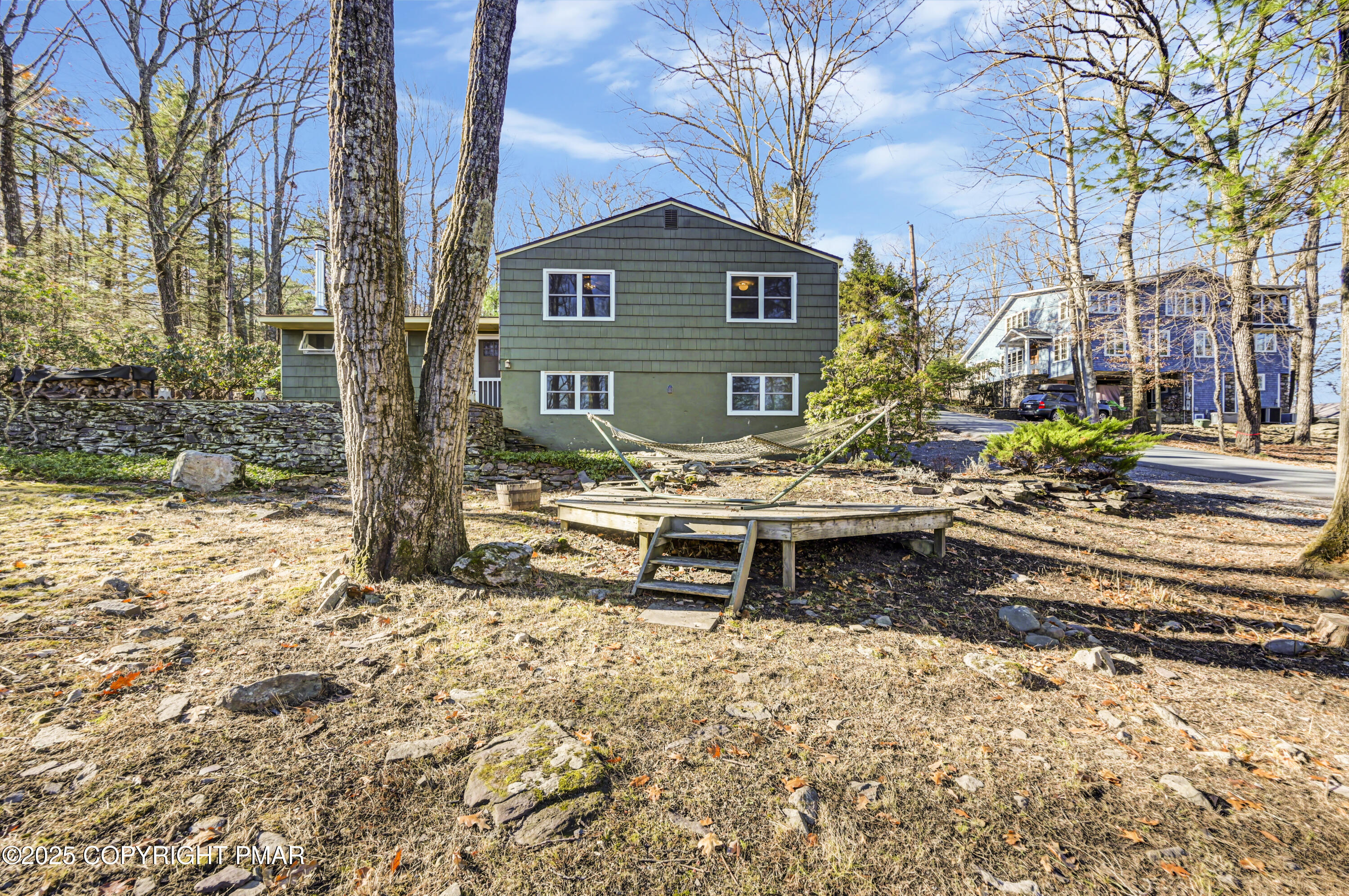 2148 Laurel Lane Cresco, PA 18326 - Photo 32 of 58 a backyard of a house with outdoor seating