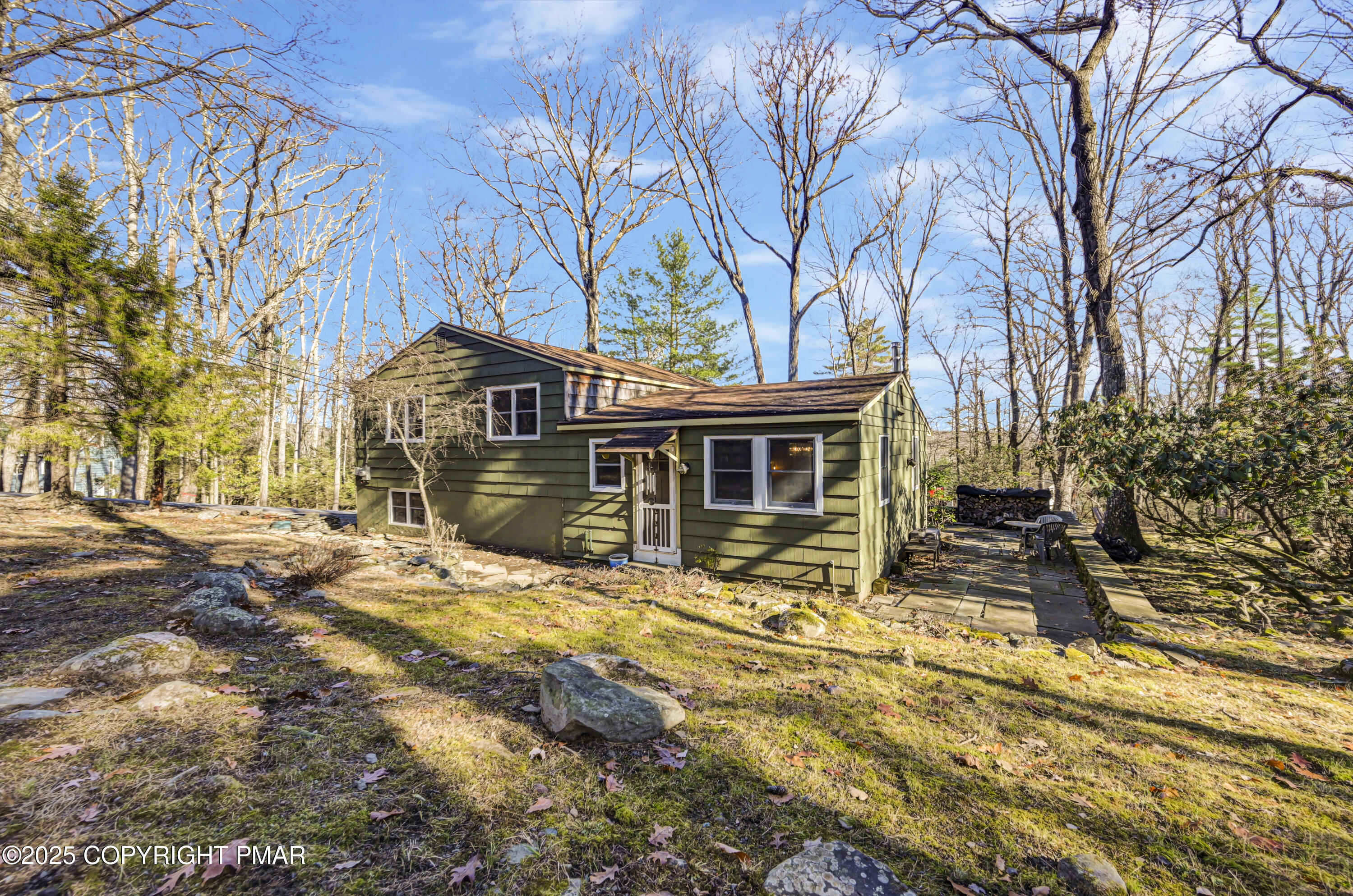 2148 Laurel Lane Cresco, PA 18326 - Photo 34 of 58 a view of a house with a large tree and wooden fence