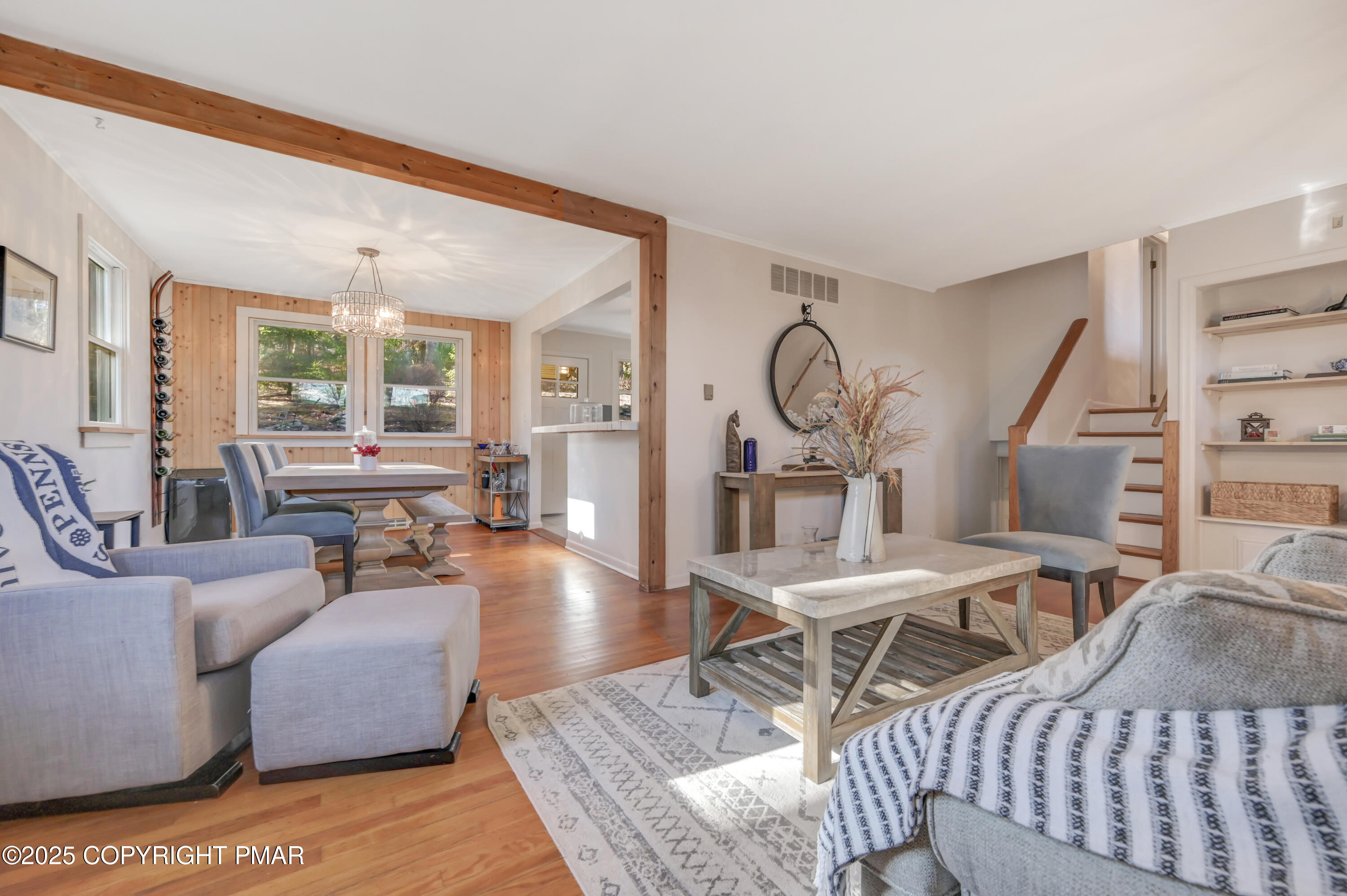 2148 Laurel Lane Cresco, PA 18326 - Photo 6 of 58 a living room with furniture a large window and wooden floor