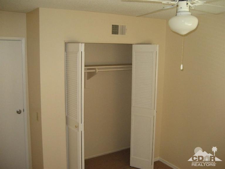 72711 Eagle Road, Unit 4 Palm Desert, CA 92260 - Photo 13 of 29 a view of a refrigerator in kitchen and a sink