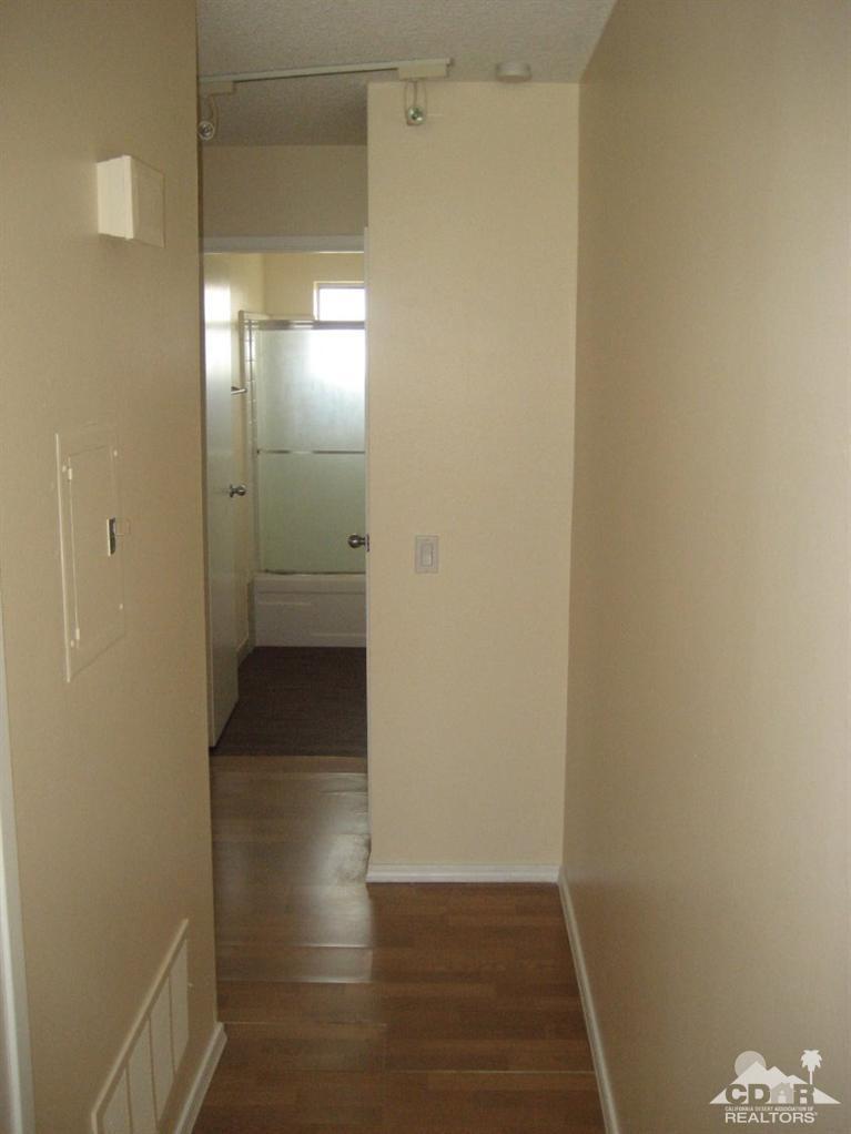 72711 Eagle Road, Unit 4 Palm Desert, CA 92260 - Photo 8 of 29 a view of a hallway