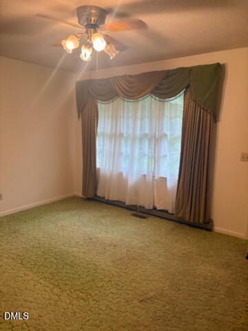 10329 Fanny Brown Road Raleigh, NC 27603 - Photo 5 of 11 a view of an empty room with a window