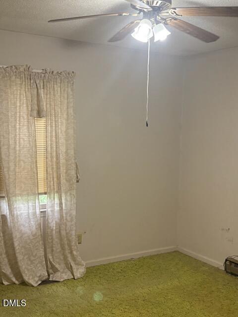 10329 Fanny Brown Road Raleigh, NC 27603 - Photo 8 of 11 a view of a chandelier fan in a room