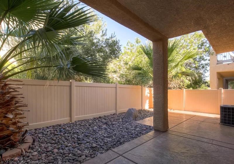 79 Stock Option Street, Unit 2 Henderson, NV 89074 - Photo 4 of 4 An inviting covered patio offers a private outdoor retreat, ideal for relaxed moments.