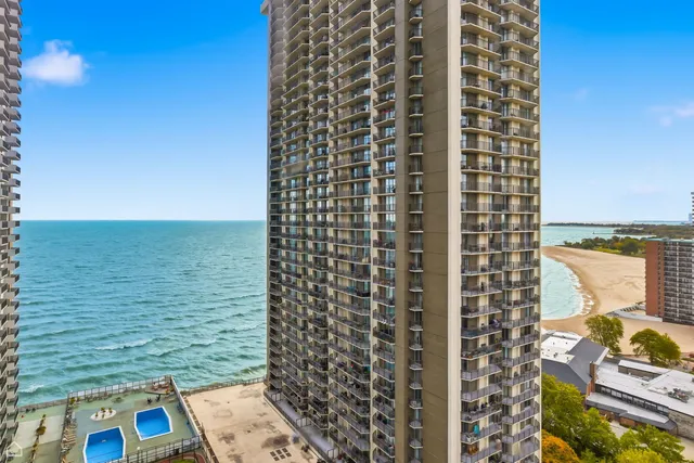 a view of a balcony with an ocean view
