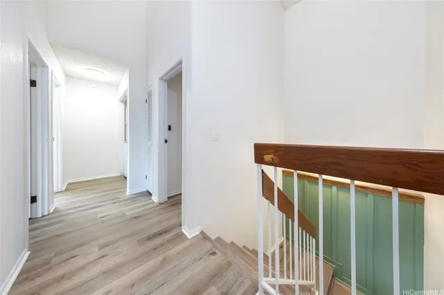 a view of entryway with wooden floor