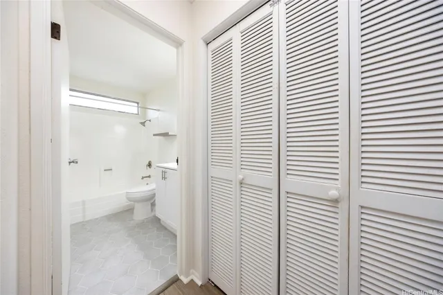 a bathroom view with a bathtub