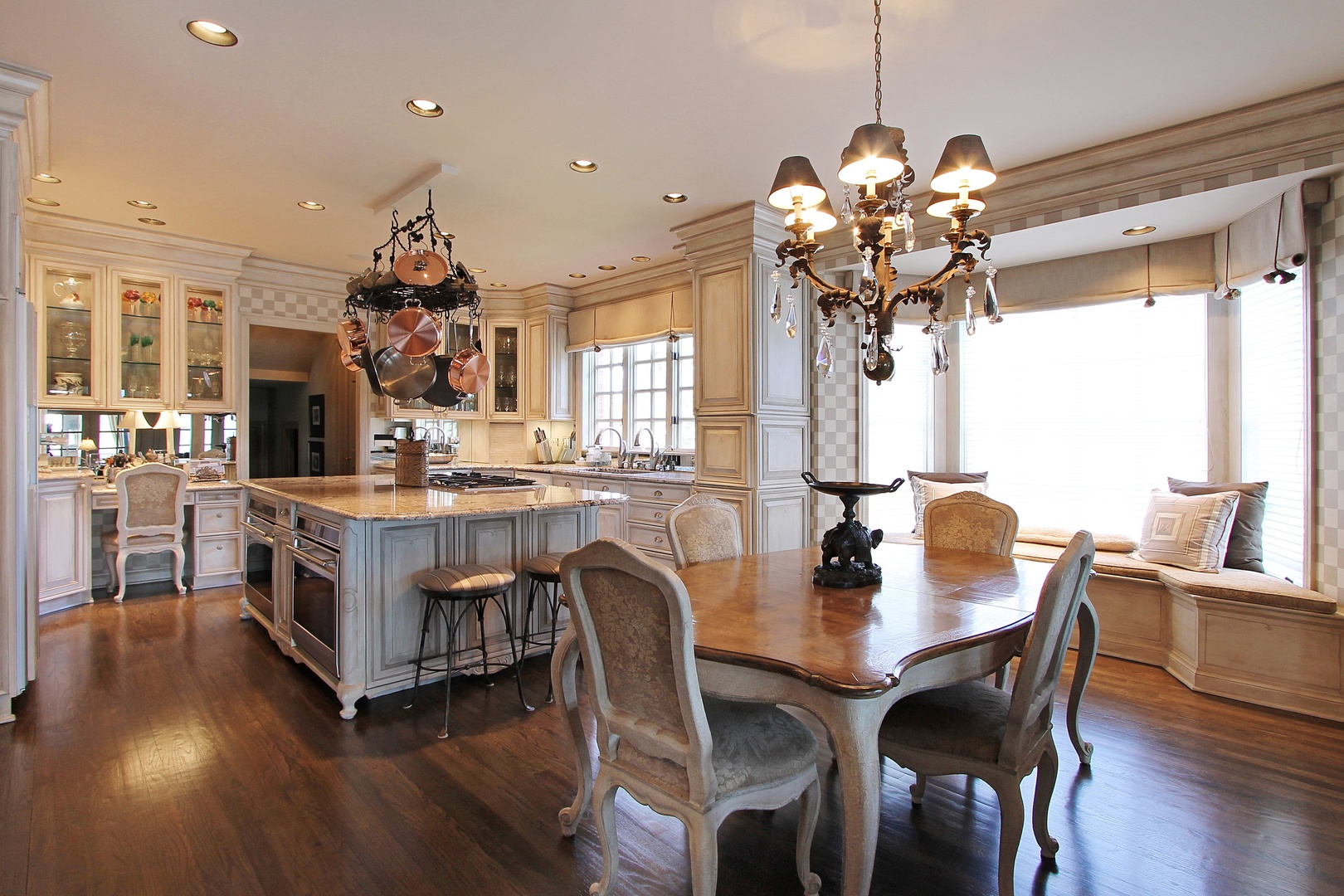 29 Riderwood Road North Barrington, IL 60010 - Photo 5 of 25 a dining room with furniture a chandelier and wooden floor
