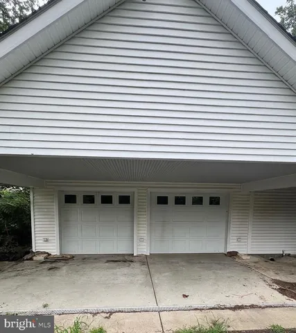 a front view of a white building