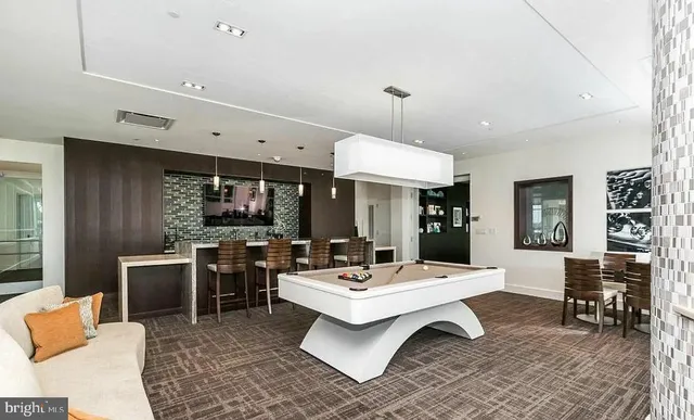 a view of a dining room with furniture