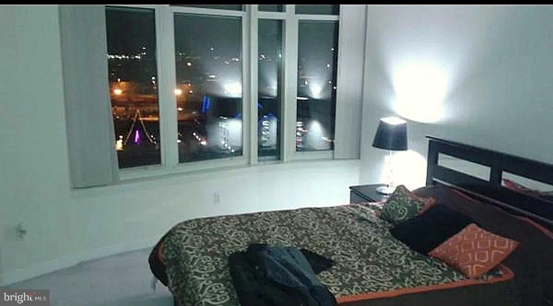 100 Harborview Drive, Unit 906 Baltimore, MD 21230 - Photo 6 of 16 a living room with furniture