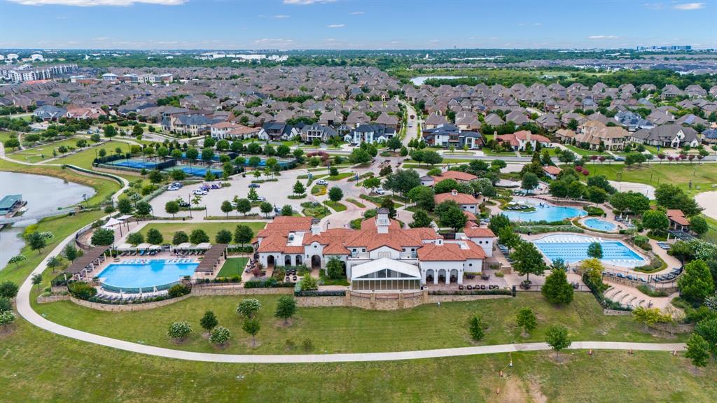 4502 Smokey Quartz Lane Arlington, TX 76005 - Photo 32 of 32 an aerial view of a house with a garden and lake view