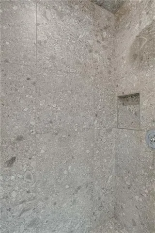 a view of a building with garden and trees