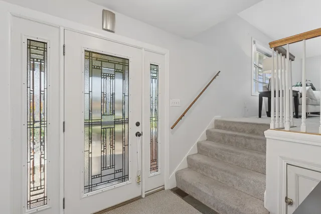 a view of an entryway with staircase