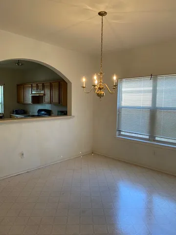 a view of a room with a chandelier