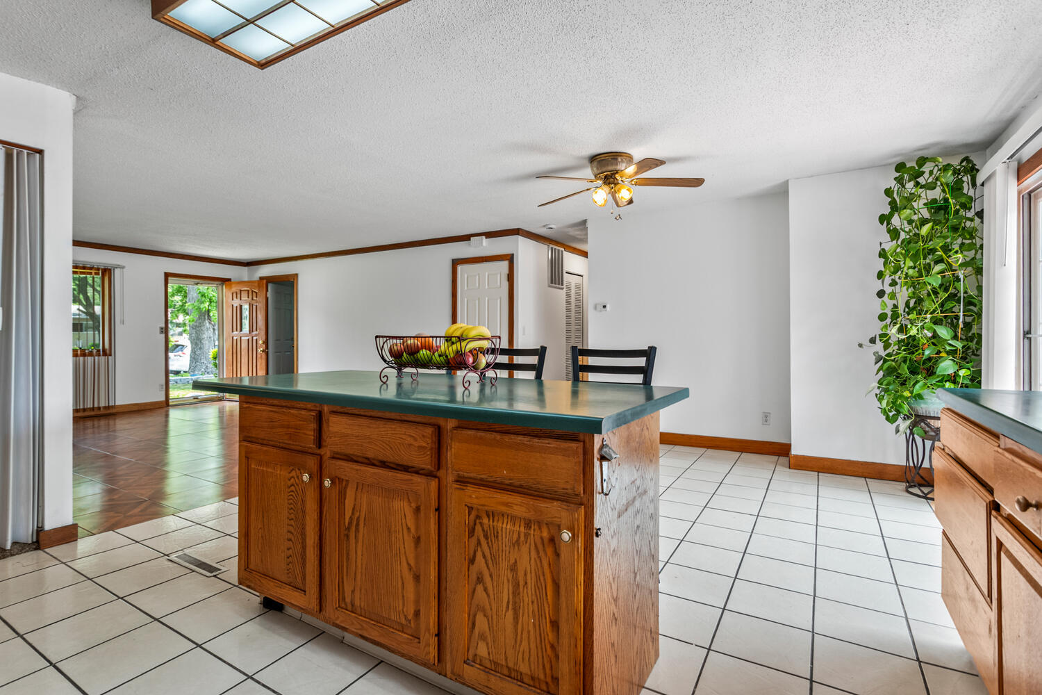 2503 Maplewood Drive Champaign, IL 61821 - Photo 14 of 37 a bedroom with a baby bed a dresser and window
