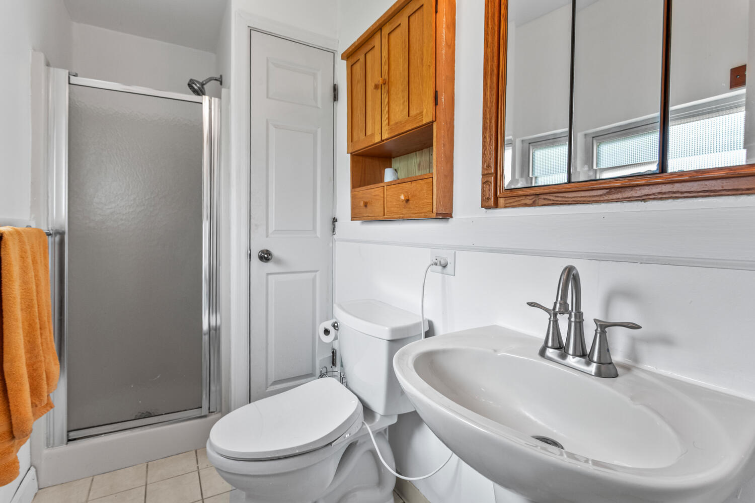 2503 Maplewood Drive Champaign, IL 61821 - Photo 22 of 37 a bathroom with a sink a toilet and shower