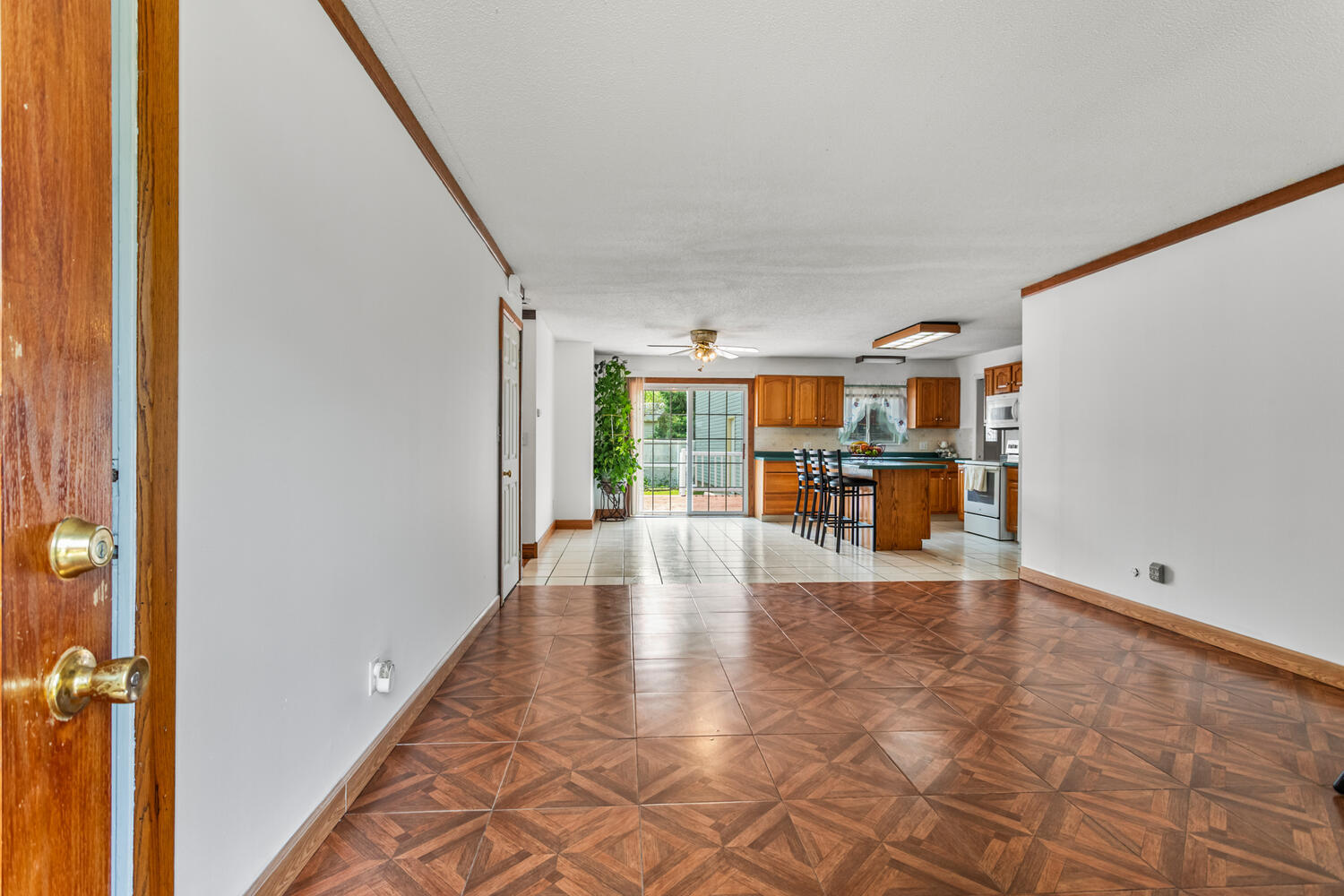 2503 Maplewood Drive Champaign, IL 61821 - Photo 5 of 37 a view of an empty room with furniture and a window