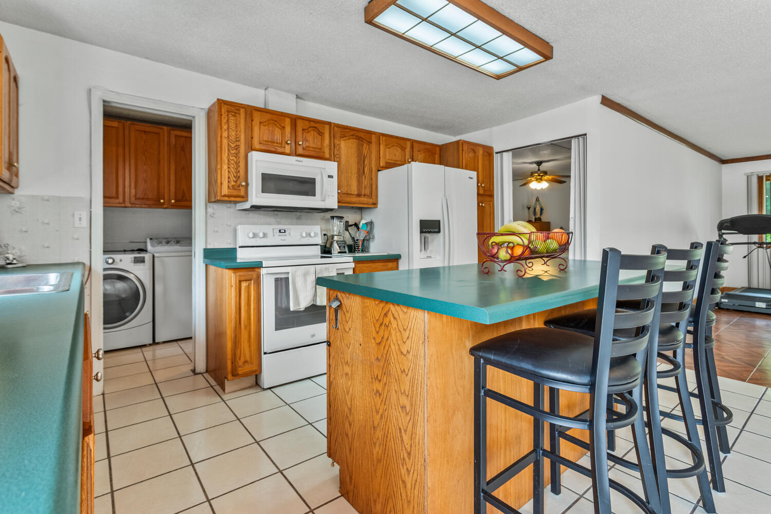 2503 Maplewood Drive Champaign, IL 61821 - Photo 10 of 37 a dining table chairs and a stove in a kitchen