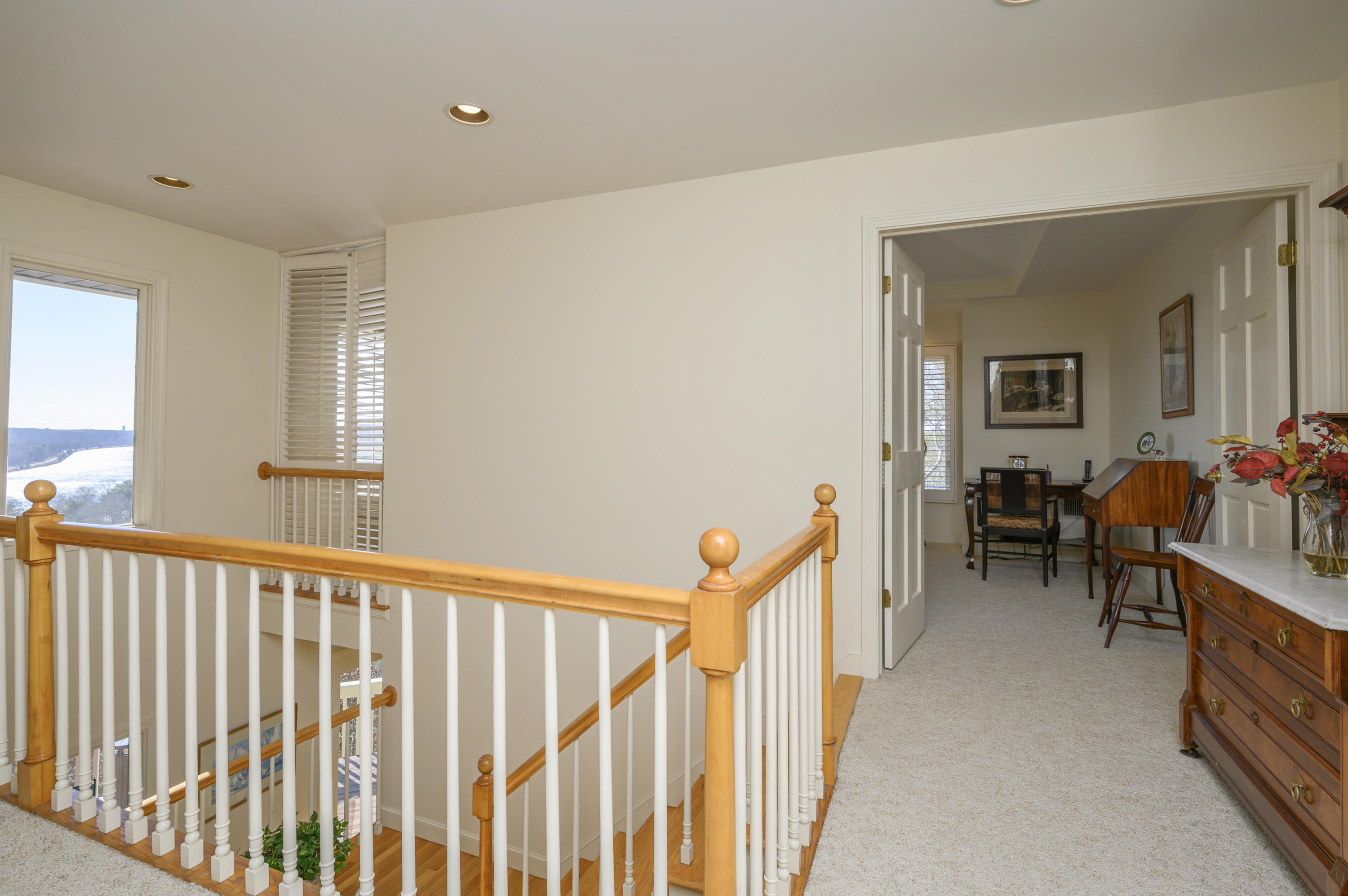 2 Dogwood Road, Unit H Buzzards Bay, MA 02532 - Photo 21 of 41 a view of a hallway with wooden floor and stairs