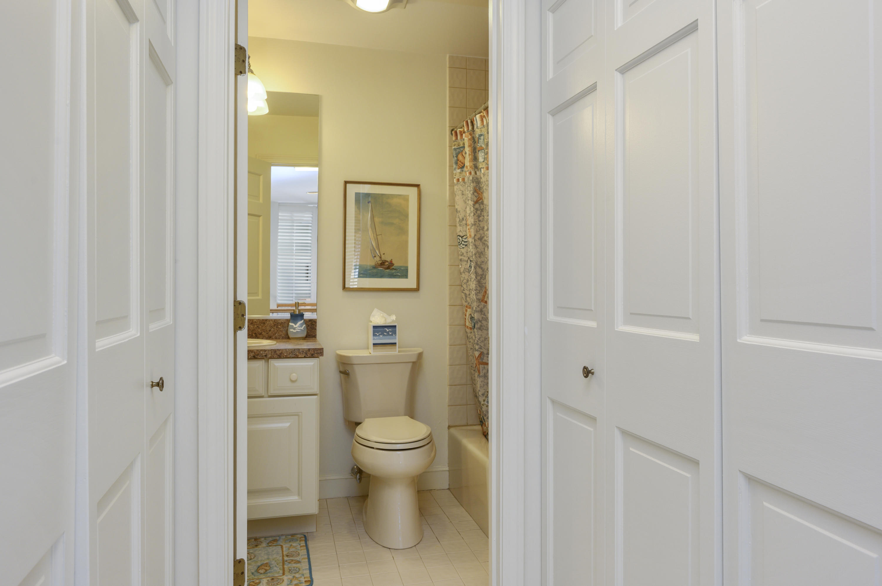 2 Dogwood Road, Unit H Buzzards Bay, MA 02532 - Photo 24 of 41 a bathroom with a toilet a sink and shower