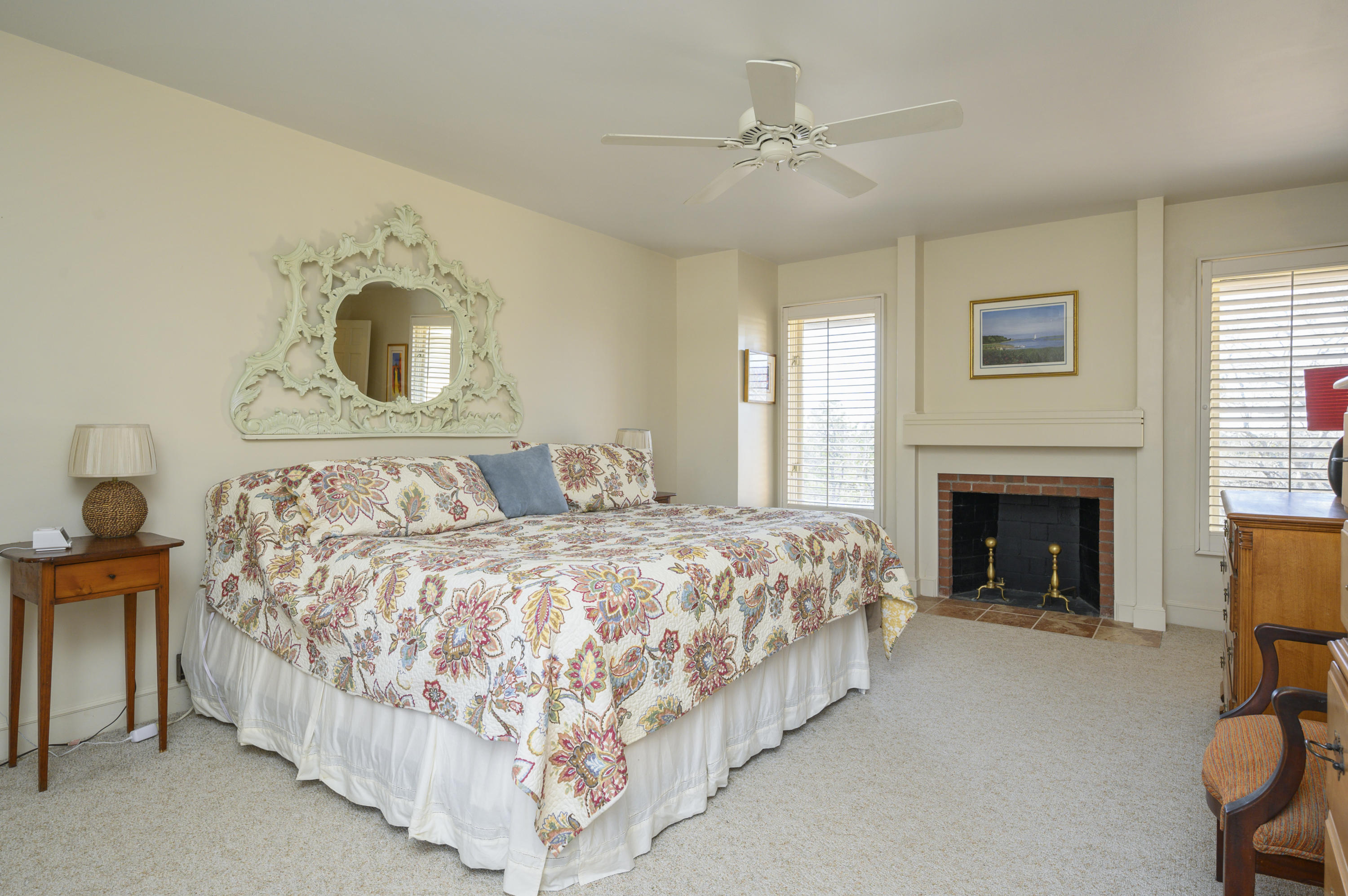 2 Dogwood Road, Unit H Buzzards Bay, MA 02532 - Photo 27 of 41 a bed room with a bed and a fireplace