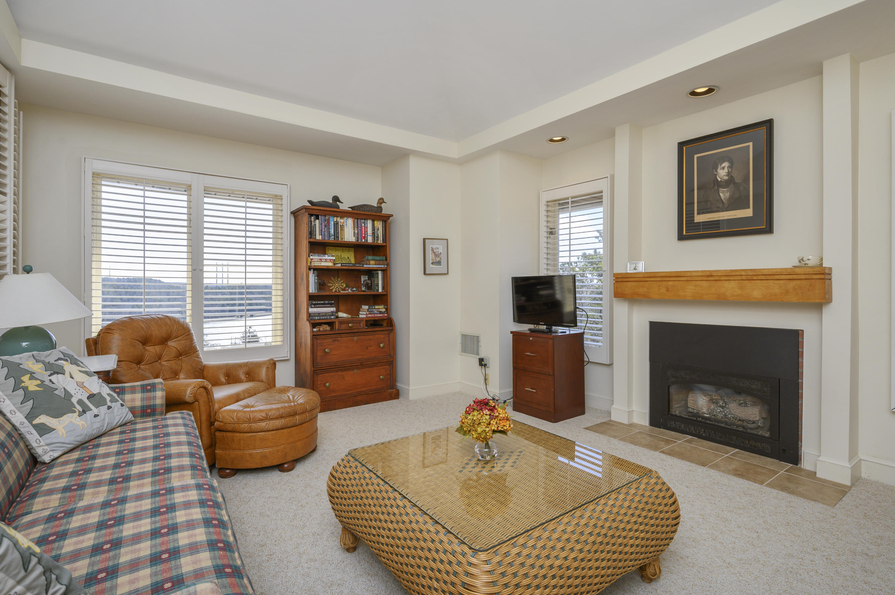 2 Dogwood Road, Unit H Buzzards Bay, MA 02532 - Photo 31 of 41 a living room with furniture fireplace and window