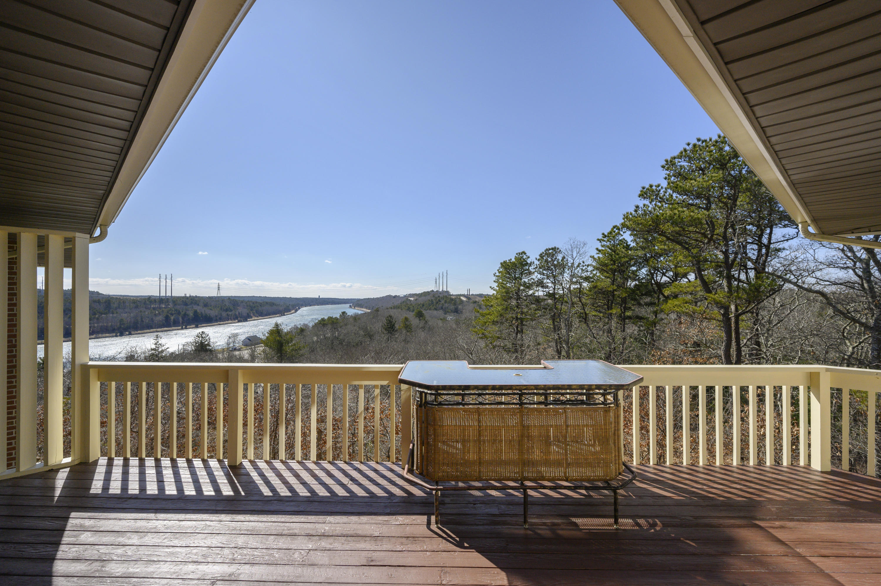 2 Dogwood Road, Unit H Buzzards Bay, MA 02532 - Photo 35 of 41 a view of a balcony with wooden floor and fence